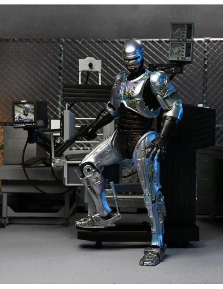 es::EMBALAJE DAÑADO Robocop Figura Ultimate Robocop Battle Damaged with Chair 18 cm.